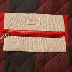 New Laura Geller Clutch